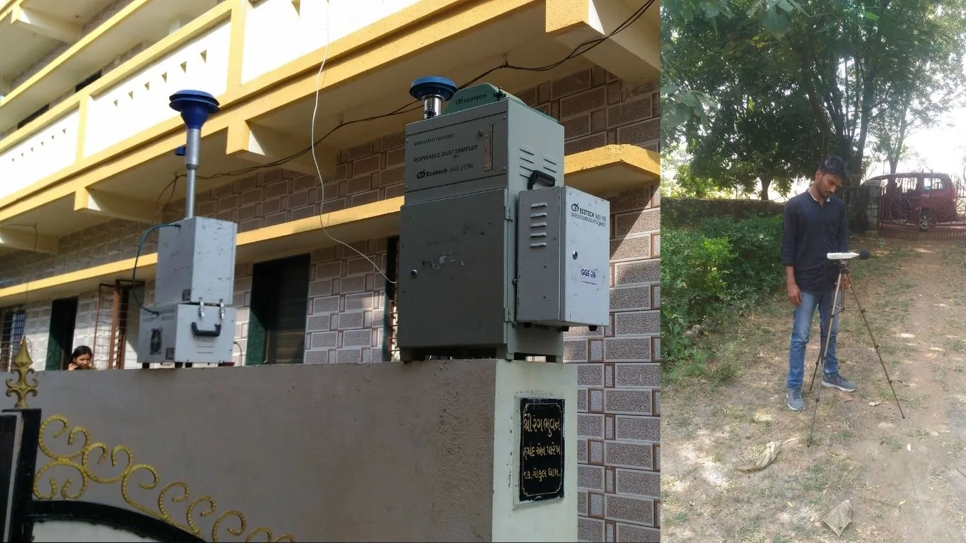 Sound level meter recording ambient noise levels at an industrial plant boundary